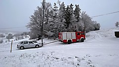 Fahrzeugberg nach Schneefall